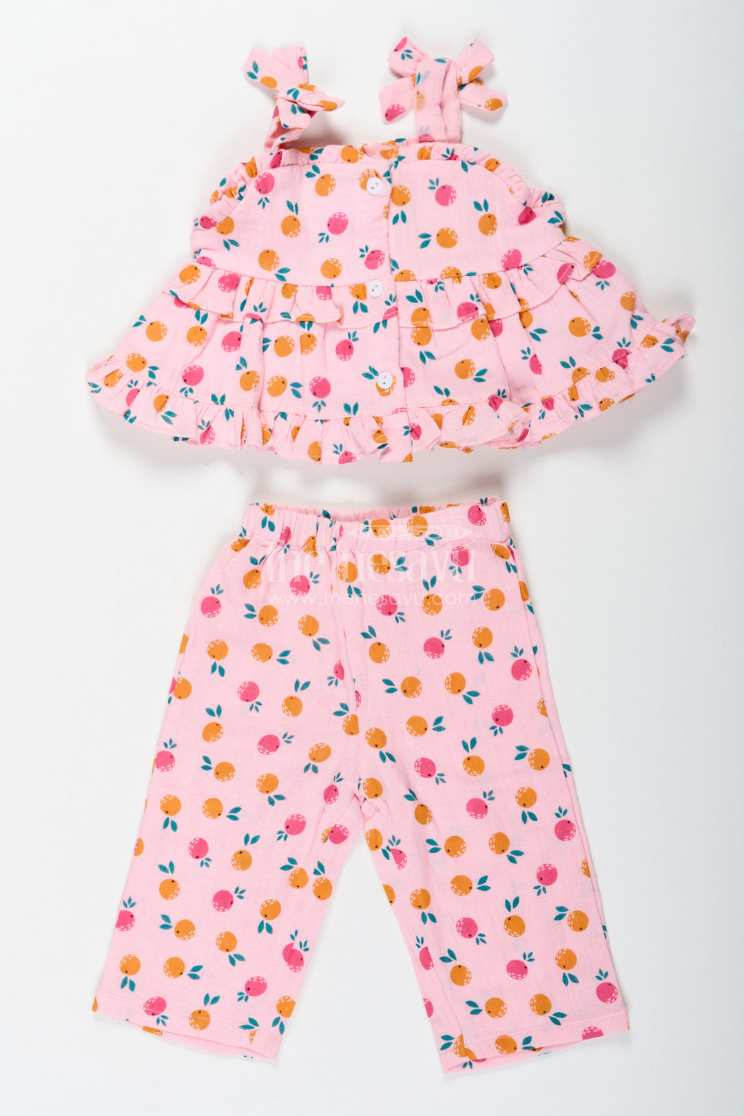 The Nesavu Girls Casual Set Girls Muslin Pink Ethnic Wear Set with Ruffle Top and Printed Pants for Comfortable Everyday Style Nesavu Nesavu Girls Muslin Printed Pink Ethnic Wear Set with Ruffle Top and Matching Pants for Daily Comfort