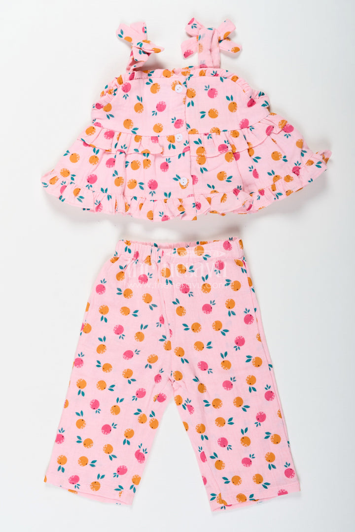 The Nesavu Girls Casual Set Girls Muslin Pink Ethnic Wear Set with Ruffle Top and Printed Pants for Comfortable Everyday Style Nesavu Nesavu Girls Muslin Printed Pink Ethnic Wear Set with Ruffle Top and Matching Pants for Daily Comfort