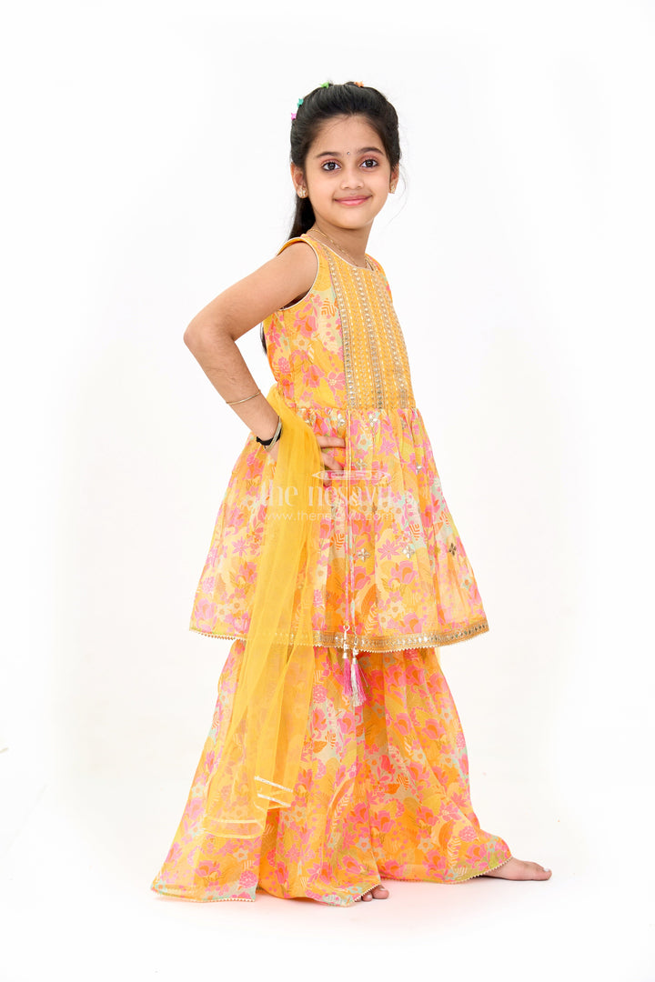 The Nesavu Girls Sharara / Plazo Set Girls Mustard Ethnic Sharara Dress with Floral Print and Sequin Detailing Nesavu Nesavu Girls Mustard Sharara Dress Floral Print Sequin Embroidery Weddings