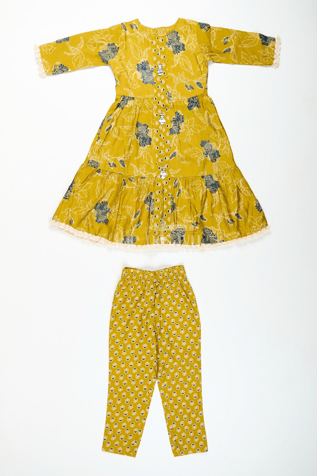The Nesavu Girls Sharara / Plazo Set Girls mustard sharara set with black floral print for festive wear Nesavu Nesavu girls mustard sharara set with floral digital print and button-front kurti