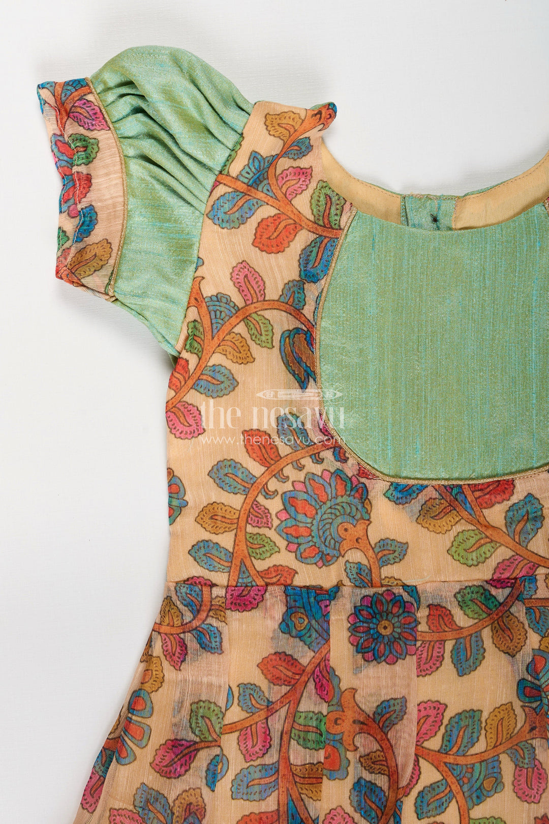 The Nesavu Silk Frock Girls New Dress Collection in Printed Chanderi Cotton with Raw Silk Yoke and Short Puff Sleeves Nesavu Nesavu New Dress Collection Girls Chanderi Cotton Raw Silk Yoke Floral Print