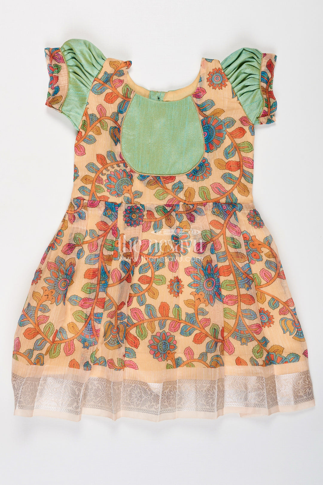 The Nesavu Silk Frock Girls New Dress Collection in Printed Chanderi Cotton with Raw Silk Yoke and Short Puff Sleeves Nesavu Nesavu New Dress Collection Girls Chanderi Cotton Raw Silk Yoke Floral Print