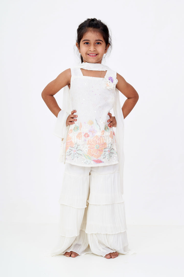 The Nesavu Girls Sharara / Plazo Set Girls Off White Sharara with Floral Embroidered Top and Layered Ruffle Pants Nesavu Nesavu Girls Off White Sharara Floral Embroidered Top Layered Ruffle Pants