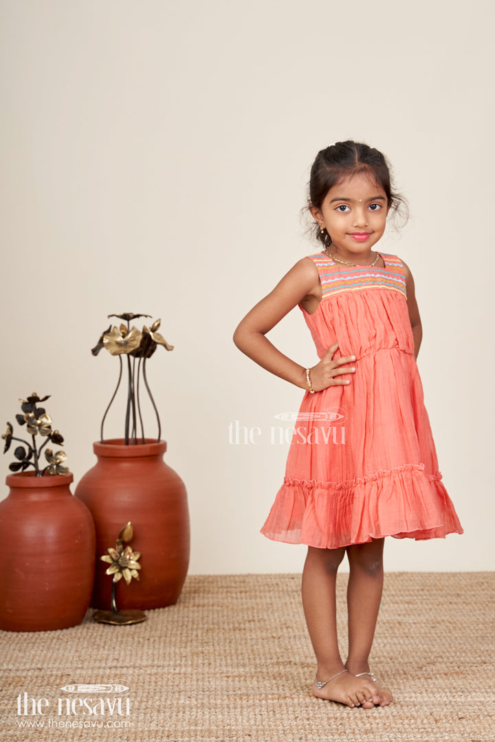 The Nesavu Girls Cotton Frock Girls Orange Frock Cotton Dress with Popcorn Crush Fabric and Colorful Thread Embroidered Yoke Nesavu Nesavu Orange Frock Cotton Dress Girls Embroidered Yoke Ruffled Hem Popcorn Crush