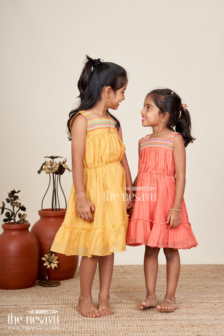 The Nesavu Girls Cotton Frock Girls Orange Frock Cotton Dress with Popcorn Crush Fabric and Colorful Thread Embroidered Yoke Nesavu Nesavu Orange Frock Cotton Dress Girls Embroidered Yoke Ruffled Hem Popcorn Crush