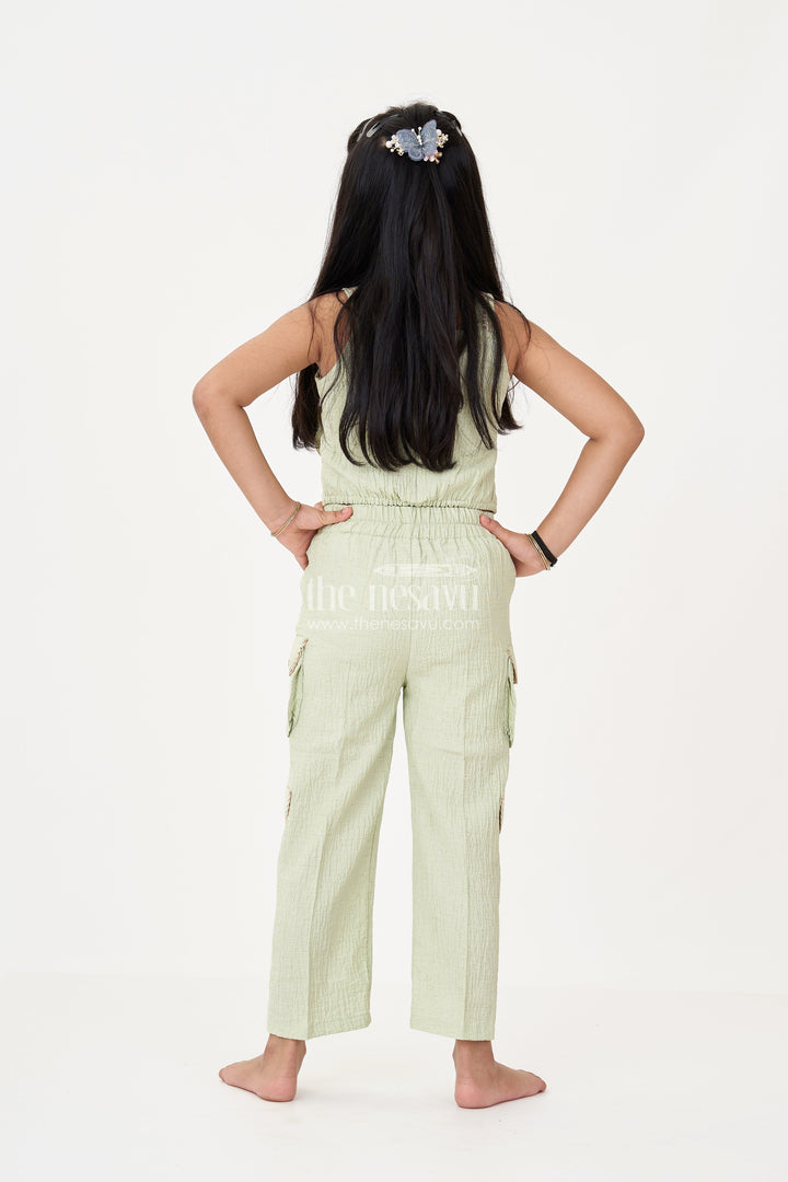 The Nesavu Girls Sharara / Plazo Set Girls Palazzo Pants for Girls in Blended Viscose Textured Fabric with 3D Floral Work and Stylish Pocket Embellishments Nesavu Nesavu Girls Palazzo Pants Girls Blended Viscose Fabric Floral Embellishment Trendy Pockets