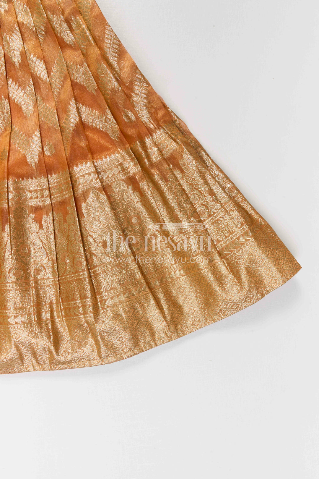 The Nesavu Pattu Pavadai Girls Pattu Pavadai for Festive Occasions and Traditional Celebrations Nesavu Nesavu Girls Pattu Pavadai In Peach Silk Blend With Tissue Skirt For Festive Occasions And Weddings