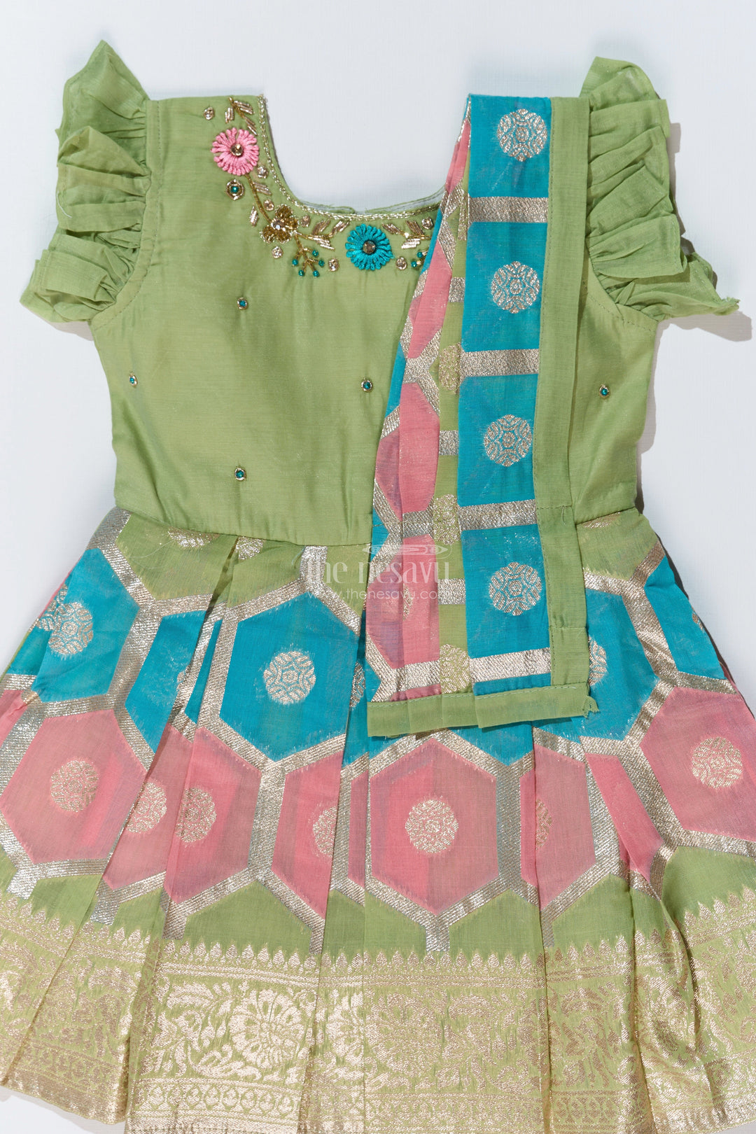 The Nesavu Silk Party Frock Girls Pattu Saree to Frock with Floral Embroidery and Rich Zari Border Nesavu Nesavu Girls Pattu Saree to Frock Floral Embroidery Zari Pleated Skirt
