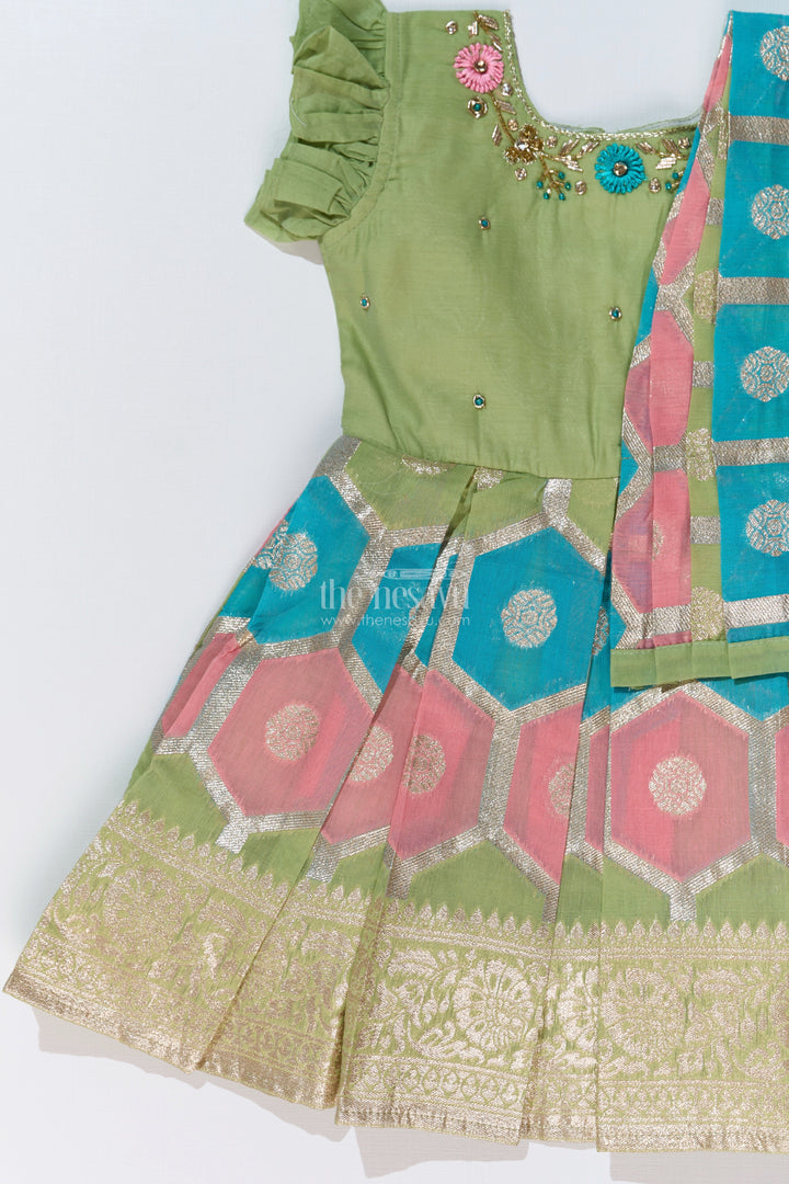 The Nesavu Silk Party Frock Girls Pattu Saree to Frock with Floral Embroidery and Rich Zari Border Nesavu Nesavu Girls Pattu Saree to Frock Floral Embroidery Zari Pleated Skirt