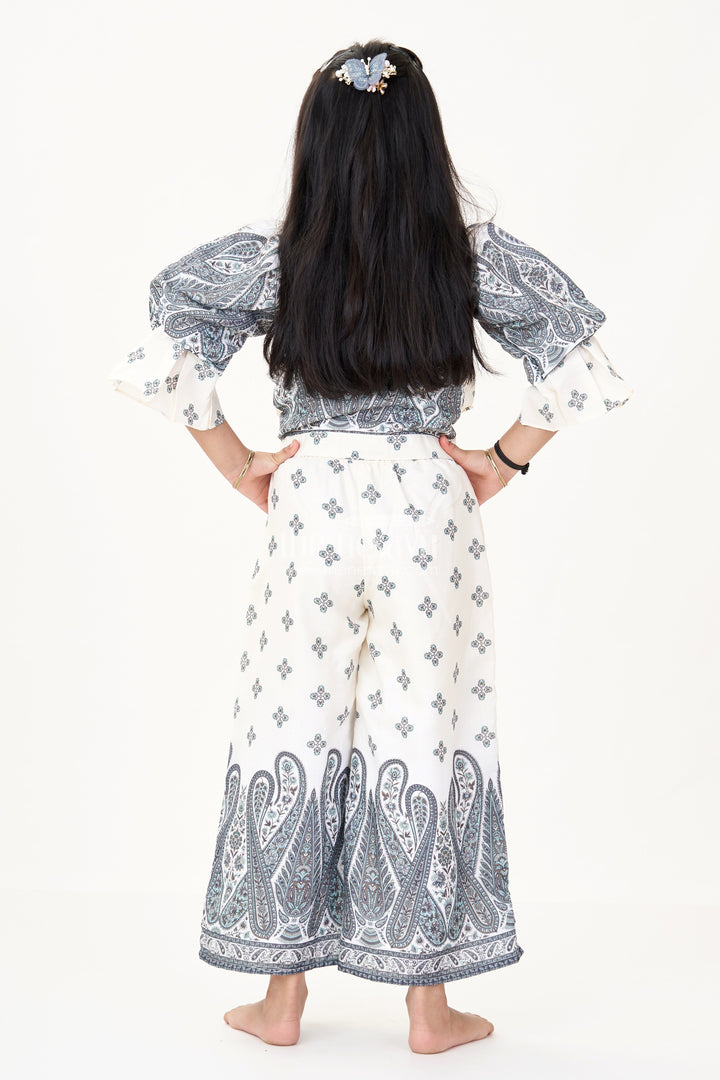 The Nesavu Girls Sharara / Plazo Set Girls Peach Palazzo Set in Cotton Blend with Paisley Print and Stylish Puffed Sleeves Nesavu Nesavu Girls Peach Palazzo Set Cotton Blend Paisley Print Modern Collared Top
