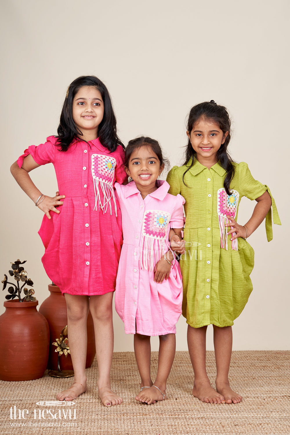 The Nesavu Girls Cotton Frock Girls pink cotton frock with crochet patch and shirt collar Nesavu Nesavu pink girls cotton frock with crochet patch and short tie sleeves for casual wear