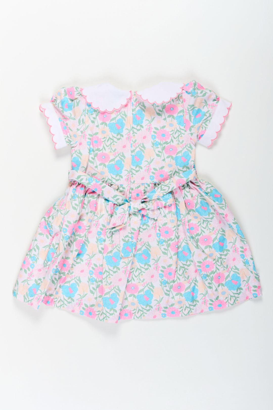 The Nesavu Girls Cotton Frock Girls Pink Flower Print Dress in Cotton with Embroidered Collar and Smocking for a Sweet Vintage Look Nesavu Nesavu Girls Cotton Pink Flower Print Dress Embroidered Collar Smocking Classic Comfort
