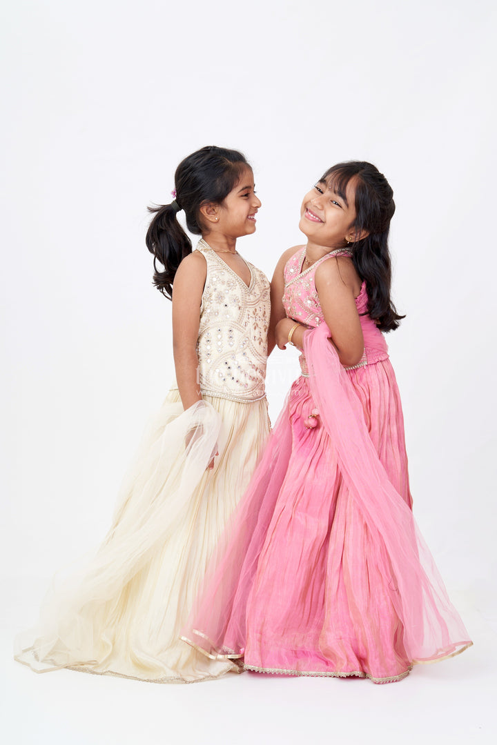 The Nesavu Girls Lehenga Choli Girls Pink Reception Lehengas with Mirror Work Halter Blouse and Flowing Silk Skirt Nesavu Nesavu Elegant Pink Halter Neck Reception Lehenga Mirror Embellished Blouse