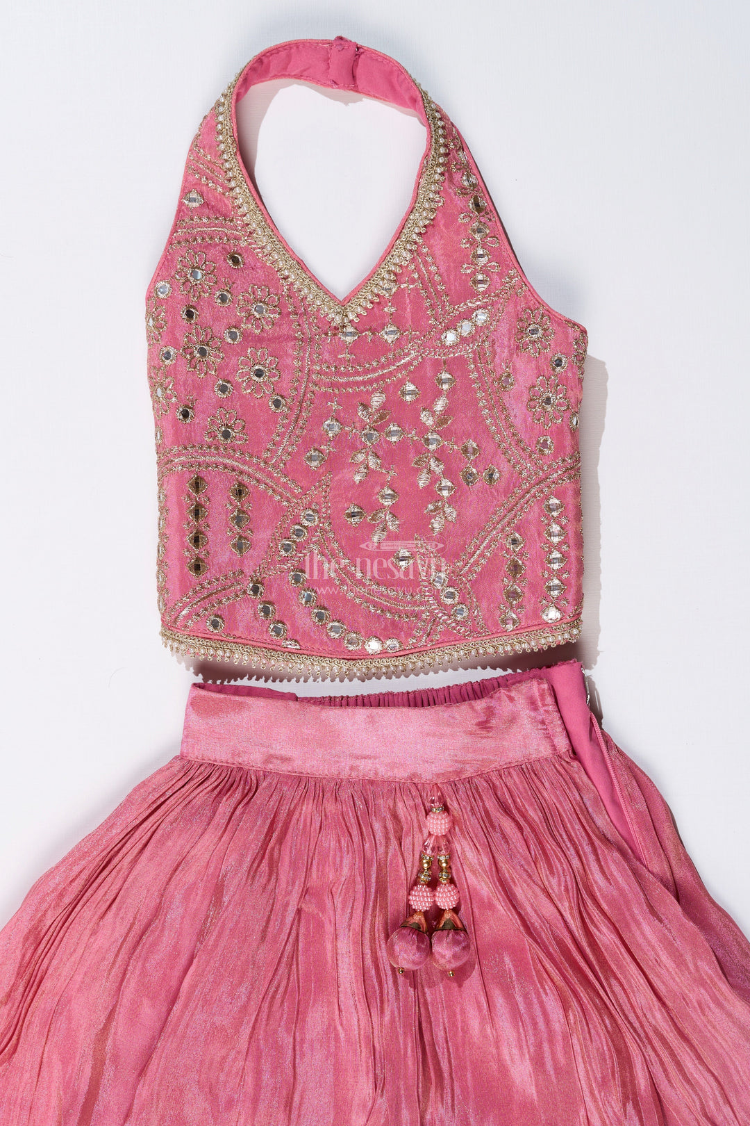The Nesavu Girls Lehenga Choli Girls Pink Reception Lehengas with Mirror Work Halter Blouse and Flowing Silk Skirt Nesavu Nesavu Elegant Pink Halter Neck Reception Lehenga Mirror Embellished Blouse