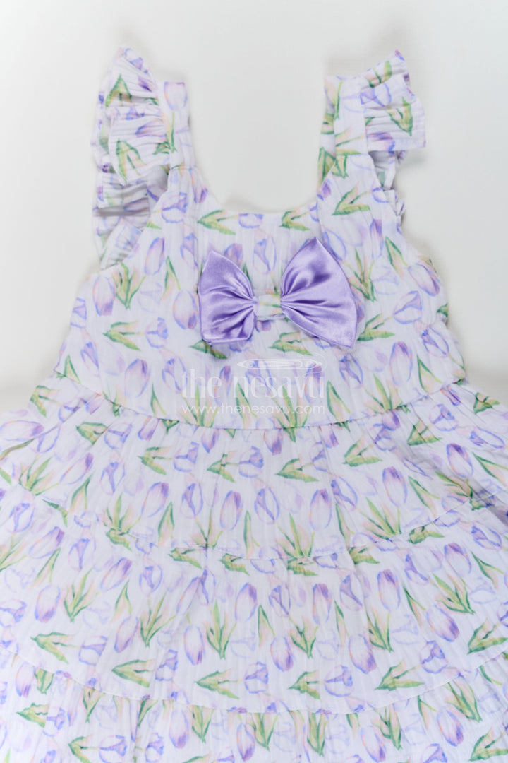 The Nesavu Baby Fancy Frock Girls Purple Floral Frocks with Sleeves in Chiffon Featuring Layered Ruffles and Bow Detail Nesavu Nesavu Girls Purple Floral Printed Chiffon Frocks Sleeves Layered Ruffles