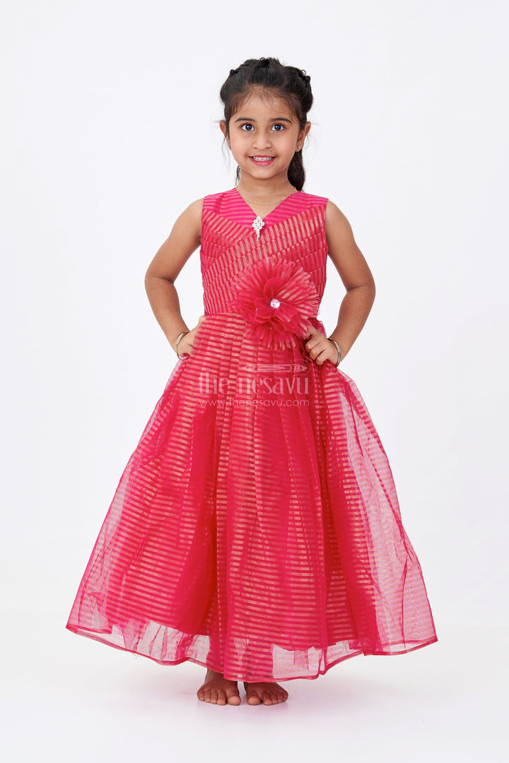 The Nesavu Girls Silk Gown Girls Red Silk Gown in Soft Net with Stripe Design and Oversized Floral Waist Embellishment Nesavu Nesavu Girls Red Silk Gown Soft Net Gold Stripes Waist Flower Detail