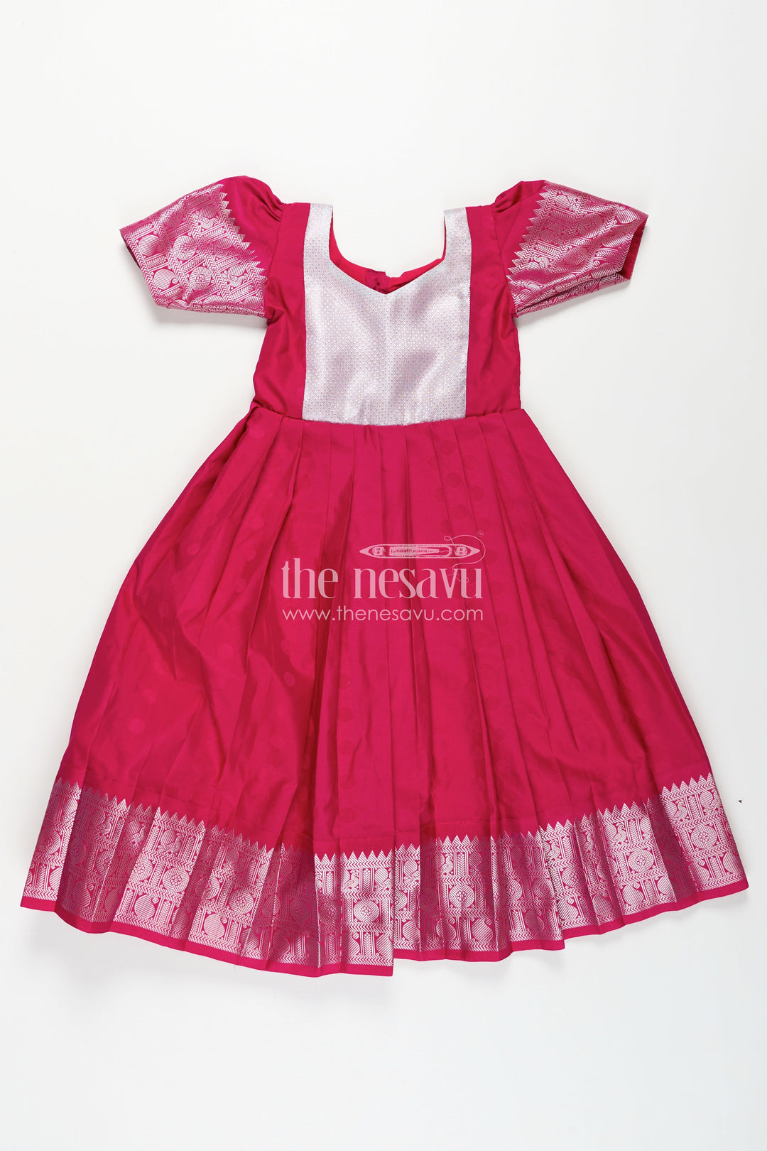 The Nesavu Girls Silk Gown Girls Semi Silk Pink Gown Design with Embellished Yoke and Traditional Zari Border Nesavu Girls Semi Silk Pink Gown Design Silver Yoke Puff Sleeves Traditional Festivities | The Nesavu