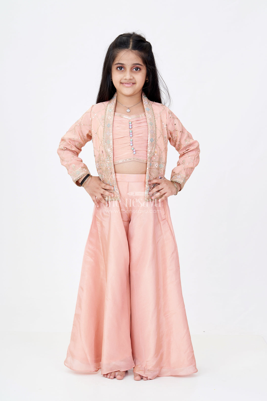 The Nesavu Girls Sharara / Plazo Set Girls Sharara Plazo Set with Embellished Jacket and Flowy Pants in Peach Nesavu 24 (5Y) / Peach GPS546A-24 Nesavu Girls Peach Sharara Plazo Set Embellished Jacket Flowy Pants