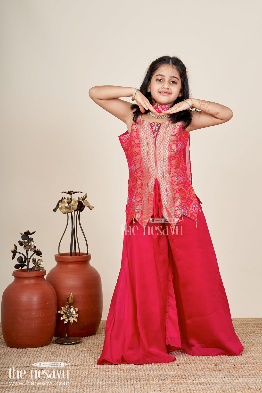 The Nesavu Girls Sharara / Plazo Set Girls sharara set for Diwali and ethnic family gatherings Nesavu Nesavu girls red sharara set in viscose silk with brocade yoke perfect for Diwali and festive gatherings