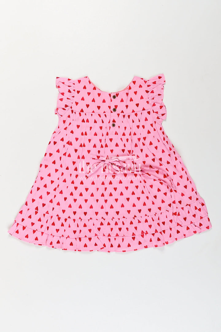 The Nesavu Girls Cotton Frock Girls Single Piece Frock in Pink Cotton with Red Heart Digital Print and Ruffled Finish Nesavu Nesavu Girls Pink Cotton Single Piece Frock Red Heart Print Ruffle Hem Detailing