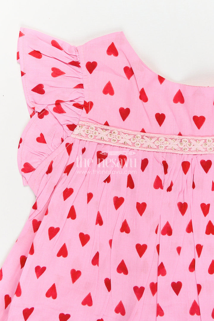 The Nesavu Girls Cotton Frock Girls Single Piece Frock in Pink Cotton with Red Heart Digital Print and Ruffled Finish Nesavu Nesavu Girls Pink Cotton Single Piece Frock Red Heart Print Ruffle Hem Detailing