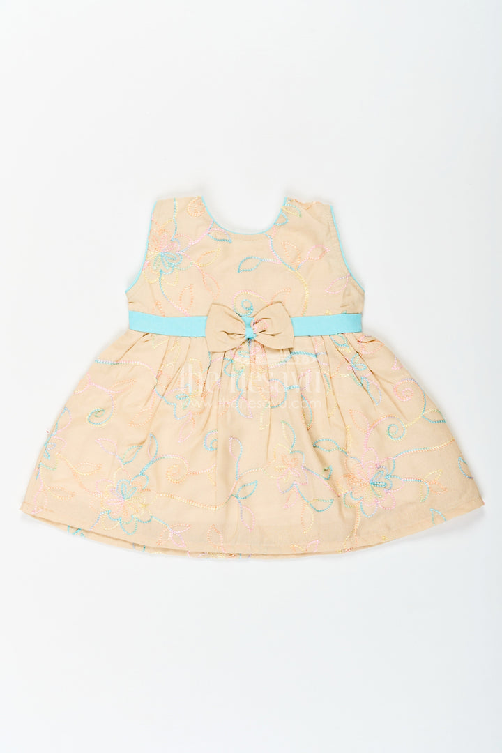 The Nesavu Baby Cotton Frocks Girls Stylish Cotton Frock with Multicolor Floral Embroidery and Aqua Waist Bow for Everyday Charm Nesavu 14 (6M) / Beige BFJ754B-14 Nesavu Stylish Cotton Frock Girls Multicolor Floral Embroidery Aqua Bow Accent