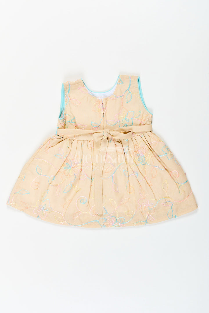 The Nesavu Baby Cotton Frocks Girls Stylish Cotton Frock with Multicolor Floral Embroidery and Aqua Waist Bow for Everyday Charm Nesavu Nesavu Stylish Cotton Frock Girls Multicolor Floral Embroidery Aqua Bow Accent