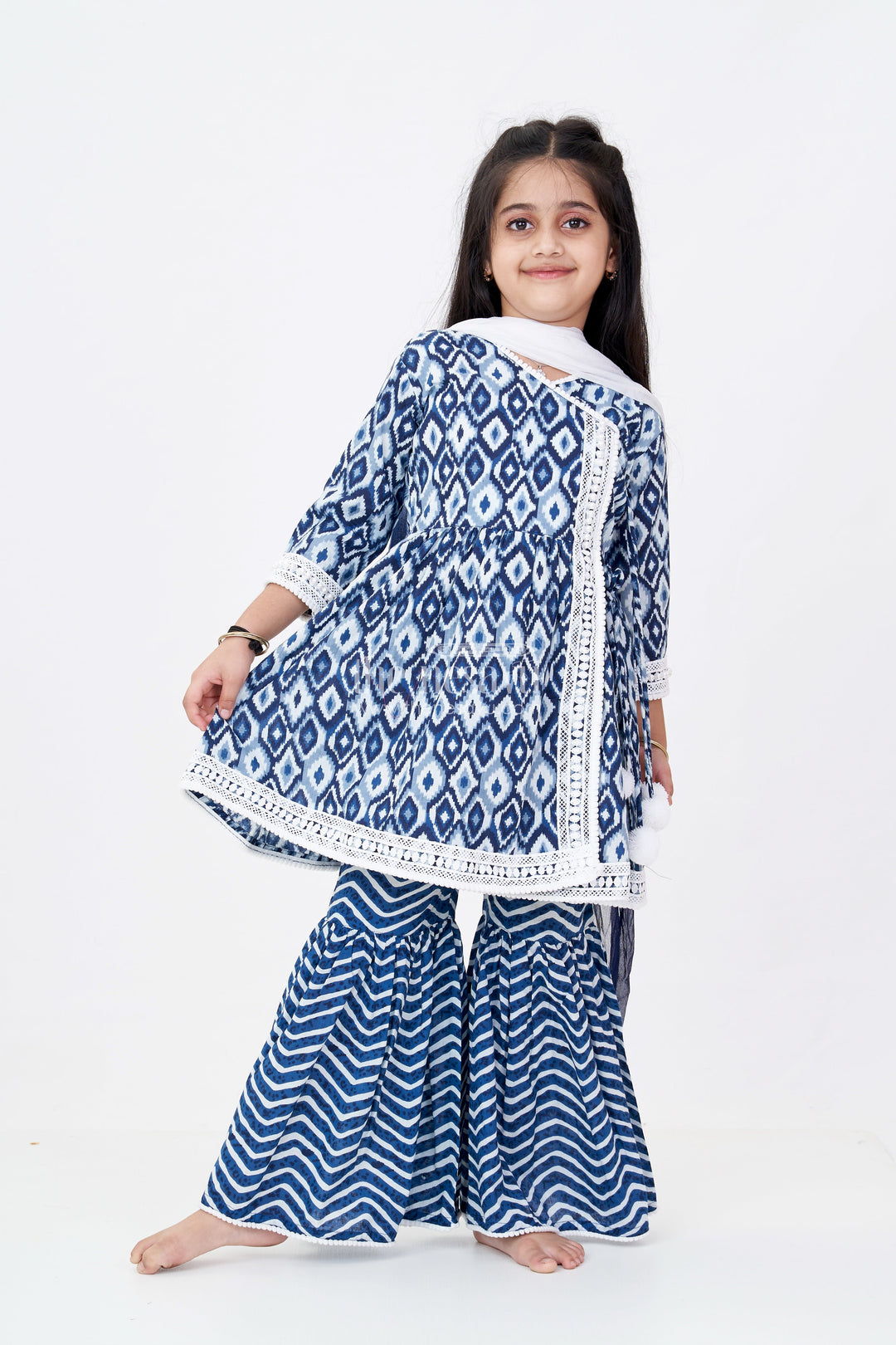 The Nesavu Girls Sharara / Plazo Set Girls Suit Plazo Set with Ikat Inspired Print and Pom-Pom Detailing in Blue and White Nesavu 24 (5Y) / Blue GPS545A-24 Nesavu Girls Blue White Suit Plazo Set Ikat Inspired Print Pom-Pom Detailing