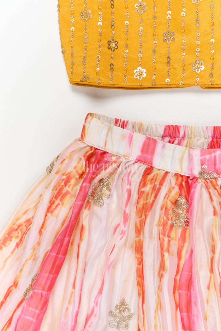 The Nesavu Girls Ethnic Lehenga Girls Tie-dye Effect Lehenga Choli Set for School Functions and Festive Playdates Nesavu Nesavu girls Chinon lehenga choli set with tie-dye effect and embroidered hem for festive events