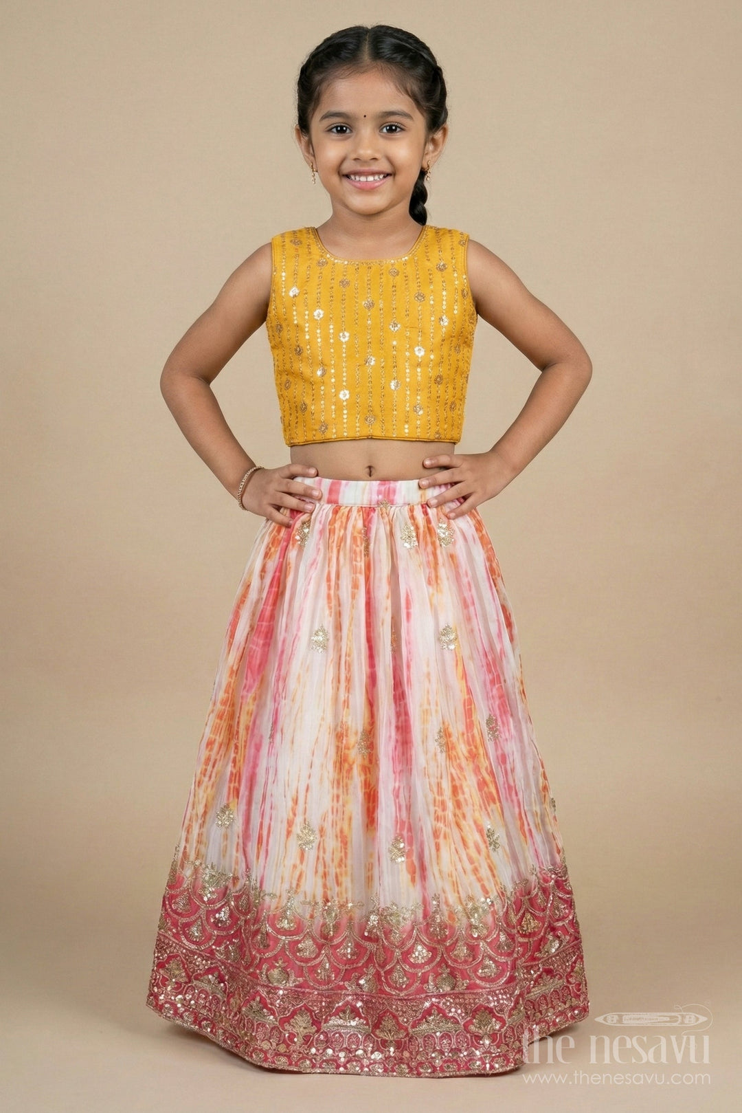 The Nesavu Girls Ethnic Lehenga Girls Tie-dye Effect Lehenga Choli Set for School Functions and Festive Playdates Nesavu Nesavu girls Chinon lehenga choli set with tie-dye effect and embroidered hem for festive events