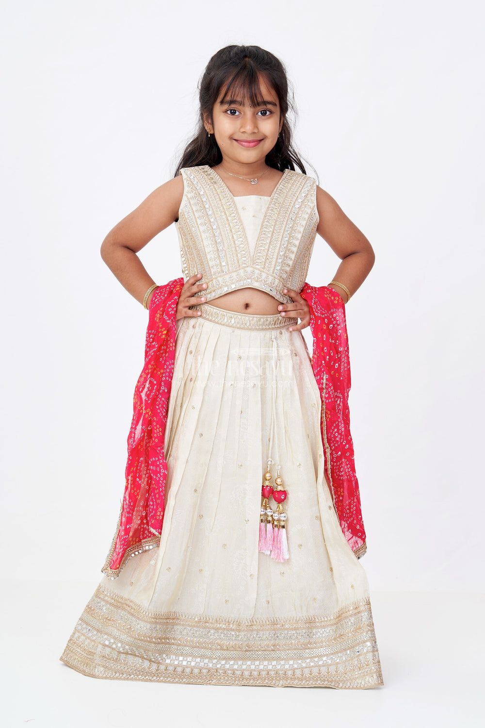 The Nesavu Girls Lehenga Choli Girls Traditional Gujarati Lehenga Choli in Cream with Mirror Work and Bandhani Dupatta Nesavu Nesavu Girls Embroidered Traditional Gujarati Lehenga Choli Bandhani Dupatta
