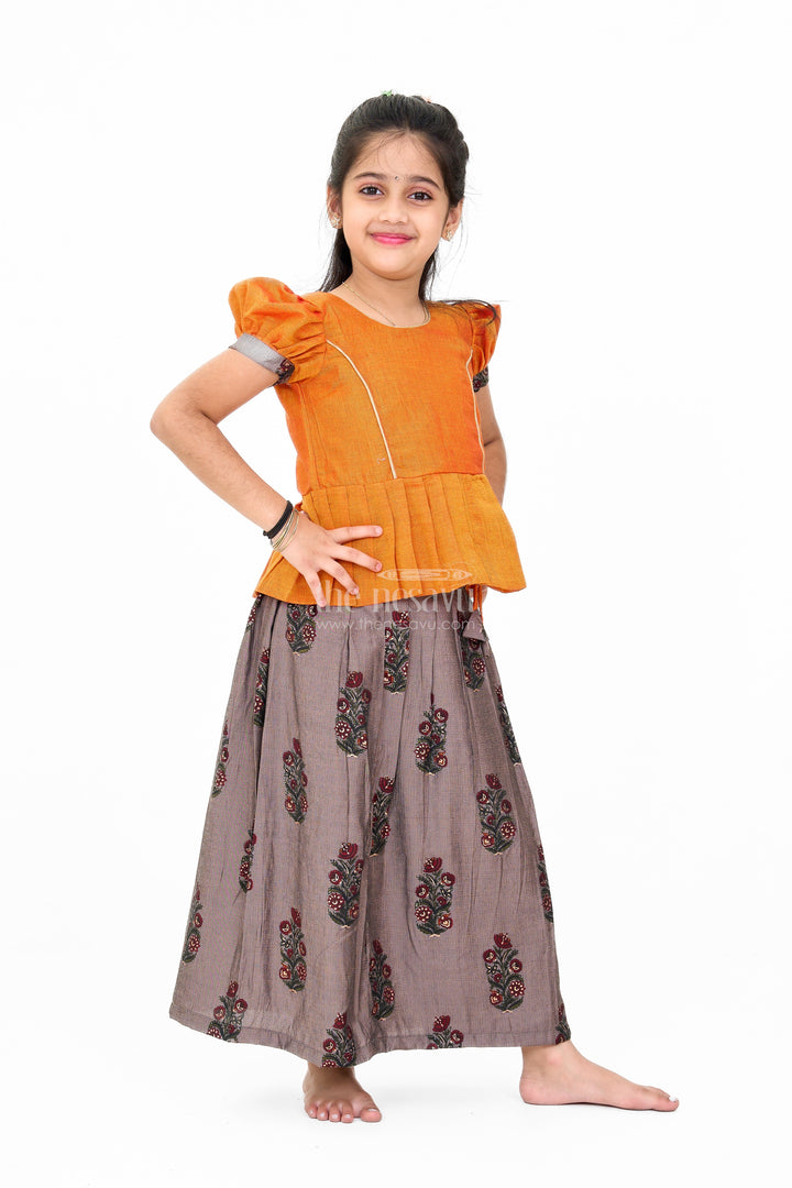 The Nesavu Pattu Pavadai Girls Traditional Pattu Pavadai Dress in Orange and Black with Silk Blend Fabric and Elegant Zari Accents Nesavu Nesavu Silk Blend Girls Pattu Pavadai Dress Orange Black Traditional Zari Style