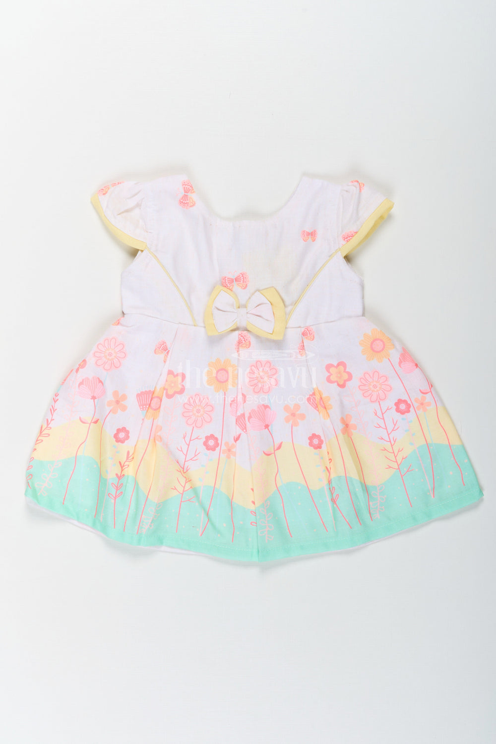 The Nesavu Baby Cotton Frocks Girls Ugadi Special Frock Dress in Soft Cotton with Pastel Floral Print and Yellow Bow Detail Nesavu 14 (6M) / Yellow BFJ756A-14 Nesavu Girls Cotton Ugadi Special Frock Dress Floral Print Yellow Waist Bow Festive Comfort