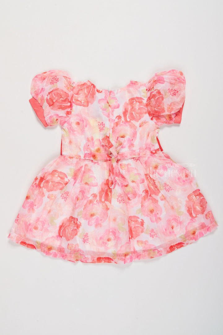 The Nesavu Girls Cotton Frock Girls Wedding Wear Georgette Dress with Peach Floral Print and Puff Sleeves Nesavu Nesavu Girls Wedding Wear Georgette Dress Peach Floral Print Puff Sleeves Coral Waistband