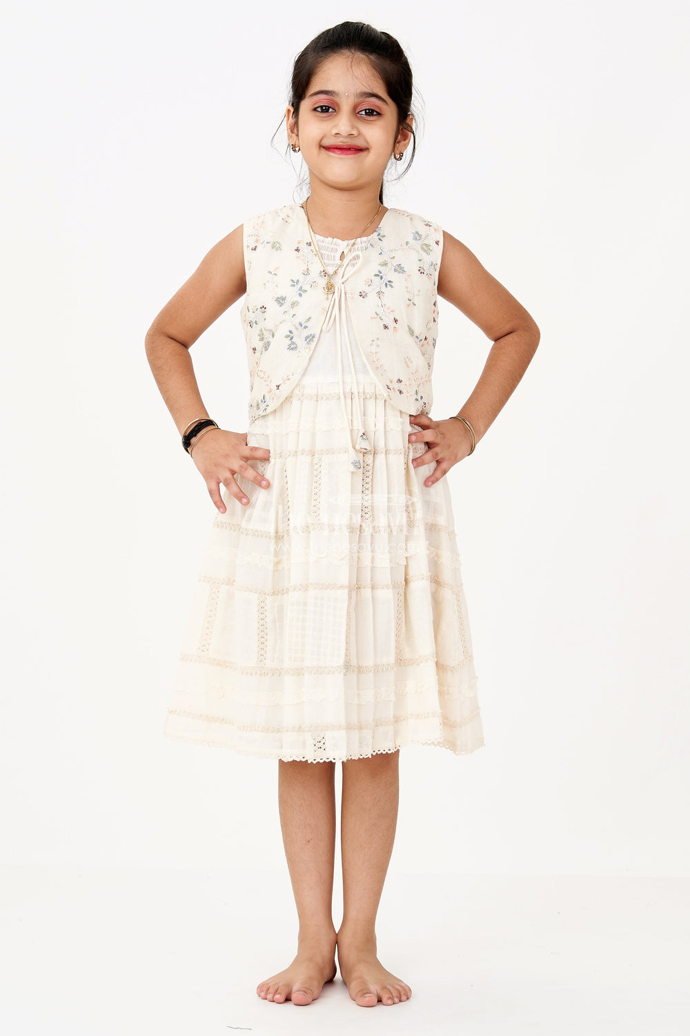 The Nesavu Girls Cotton Frock Girls White Color Frock with Embroidery and Layered Pleats for Graceful Festive Wear Nesavu Nesavu Girls White Color Cotton Frock Embroidery Layered Pleats Festive Wear