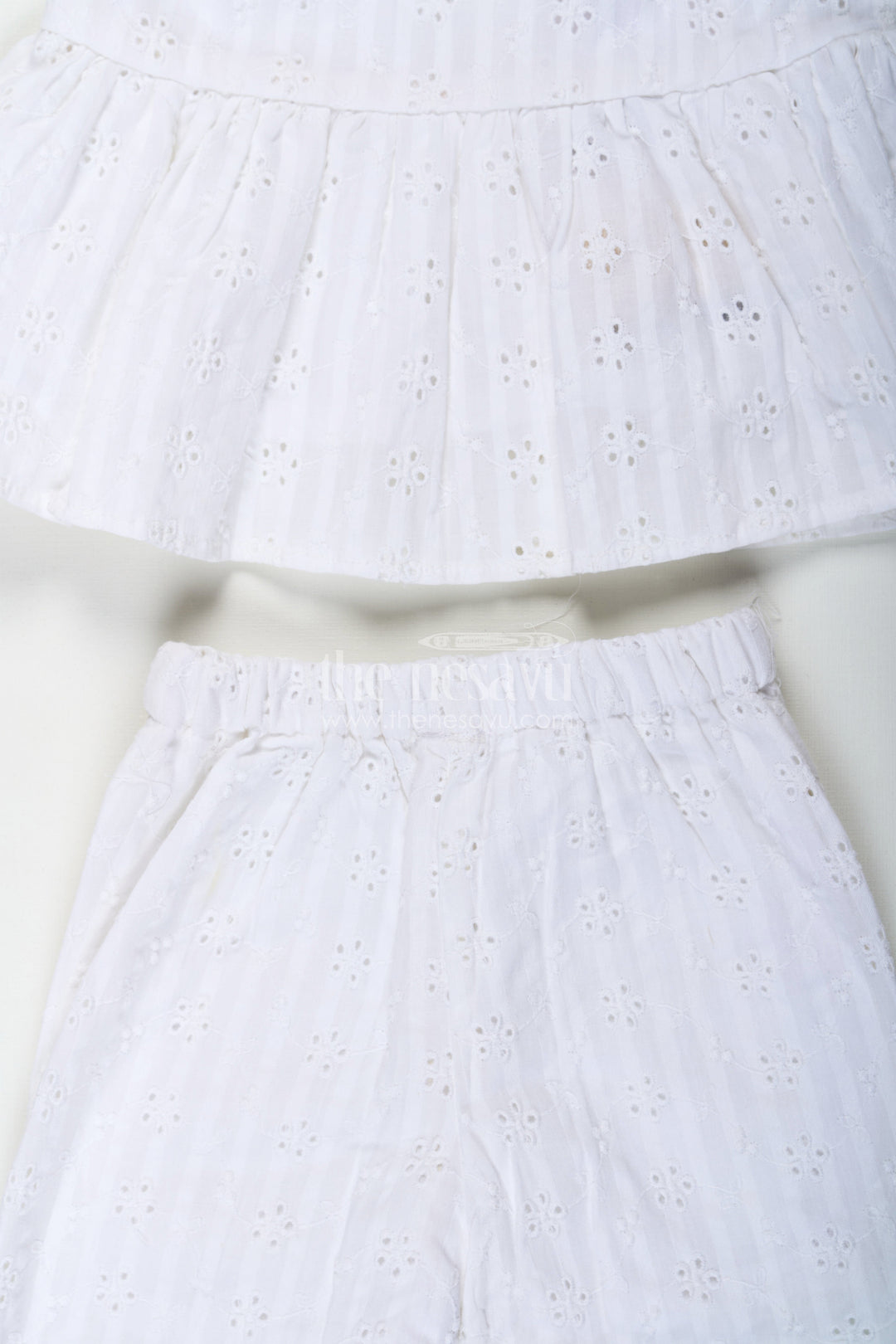 The Nesavu Girls Casual Set Girls White Party Wear Set in Hakoba Cotton with Bow-Tie Straps and Elegant Embroidery Nesavu Nesavu Girls White Party Wear Set in Hakoba Cotton with Embroidered Design and Bow-Tie Top