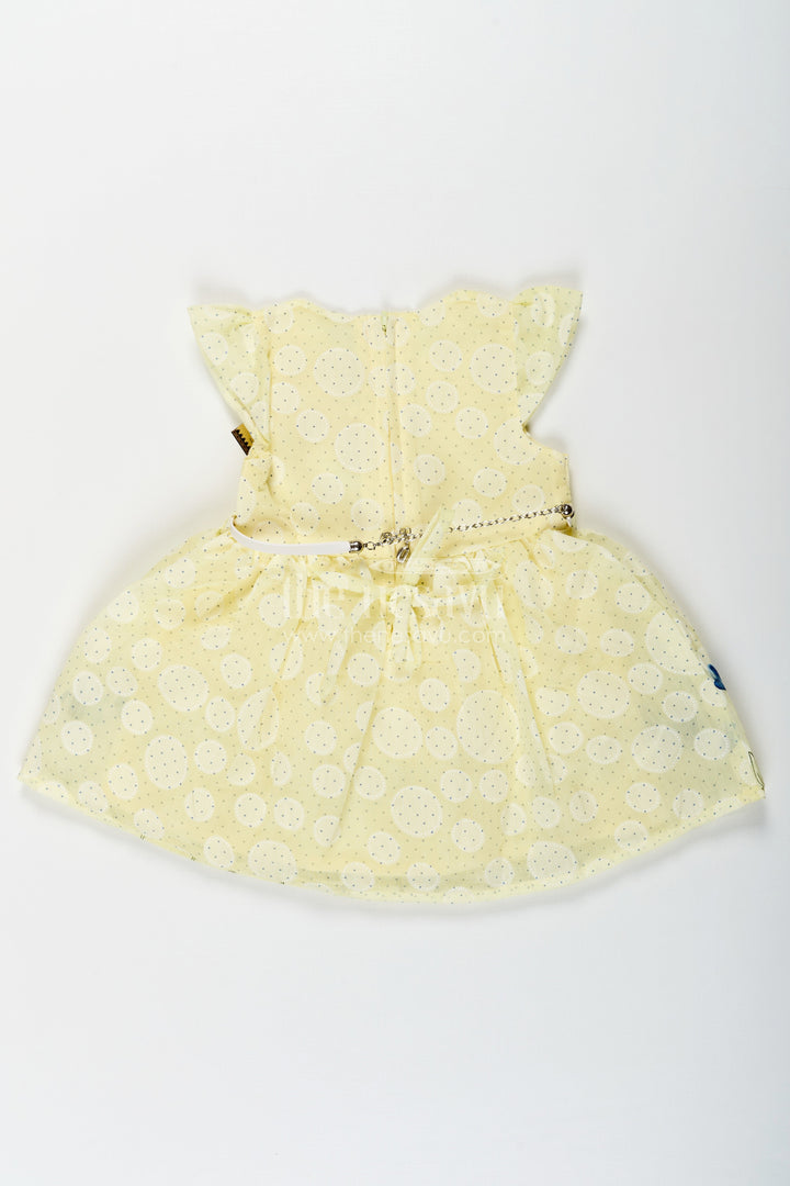 The Nesavu Baby Cotton Frocks Girls Yellow Cotton Blend Polka Dot Frock with Blue Floral Hem and Flared Sleeves for Baby Wear Nesavu Nesavu Baby Girls Yellow Polka Dot Cotton Frock Blue Floral Border Soft Blend Fabric