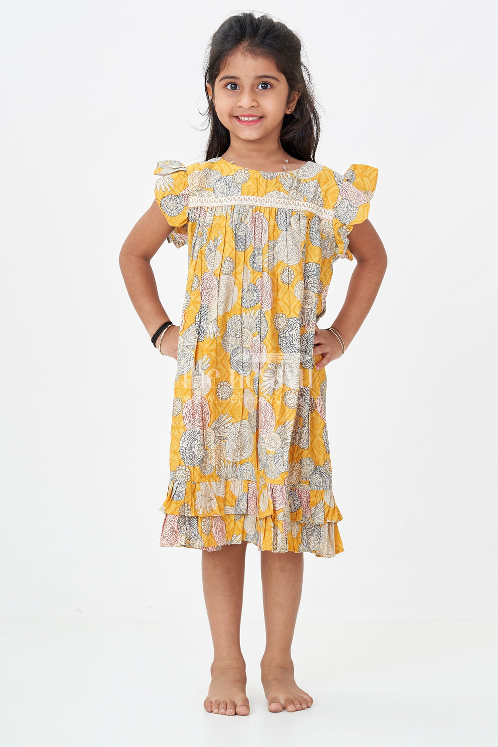 The Nesavu Girls Fancy Frock Girls Yellow Frock Design in Moadal Silk with Digital Floral Print and Ruffle Sleeves for Bright Looks Nesavu Nesavu Girls Yellow Frock Design Moadal Silk Floral Print Ruffle Sleeves