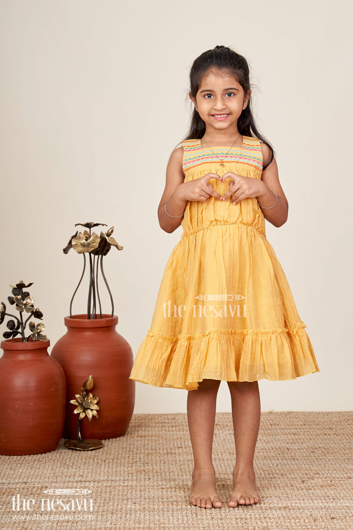 The Nesavu Girls Cotton Frock Girls Yellow Frocks Design with Popcorn Crush Cotton and Multicolor Embroidered Details Nesavu Nesavu Yellow Frocks Design Girls Thread Embroidery Soft Popcorn Crush Cotton Finish