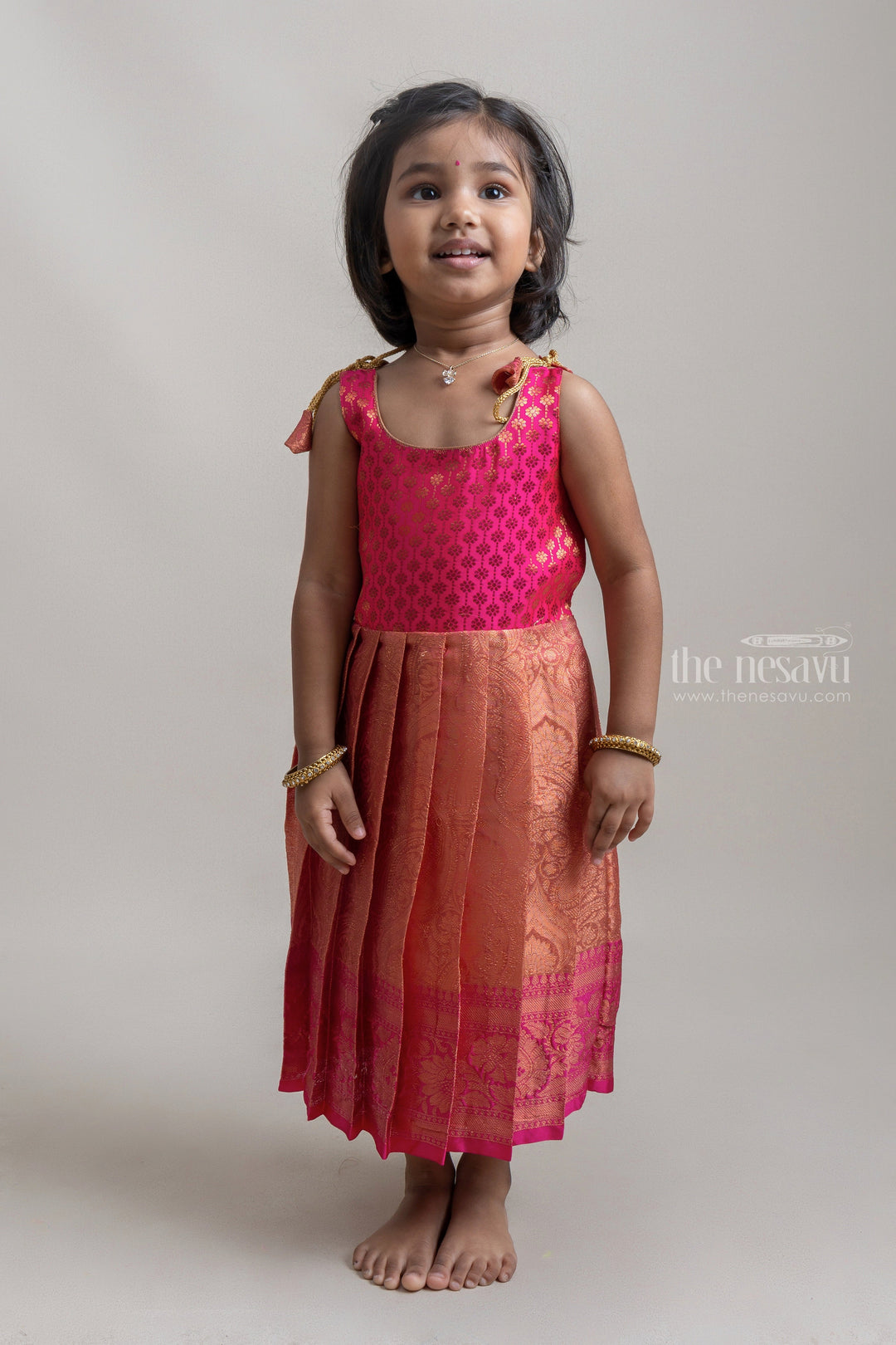 The Nesavu Tie-up Frock Gold And Pink Semi-Silk Tie-Up Frocks With Copper Toned Zari Border Nesavu Dynamic Tie-up Silk Frocks| Pattu Cheera Frocks| The Nesavu