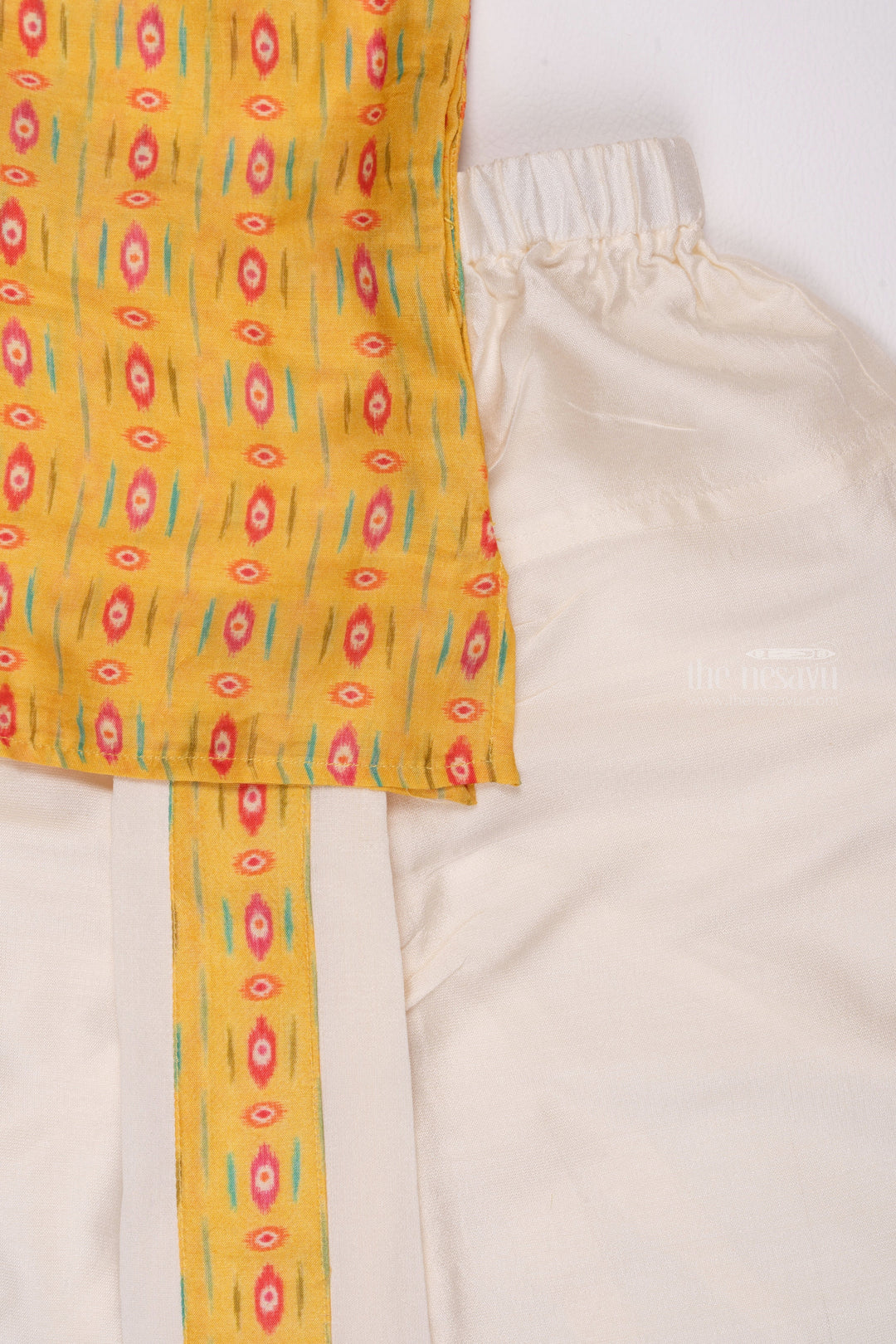 The Nesavu Boys Dothi Set Golden Glory: Mesmerizing Ikat Print Yellow Kurta with Traditional White Dhoti for Boys Nesavu Designer Boys Ethnic Outfits | Latest Kurta with Dhoti Set | The Nesavu