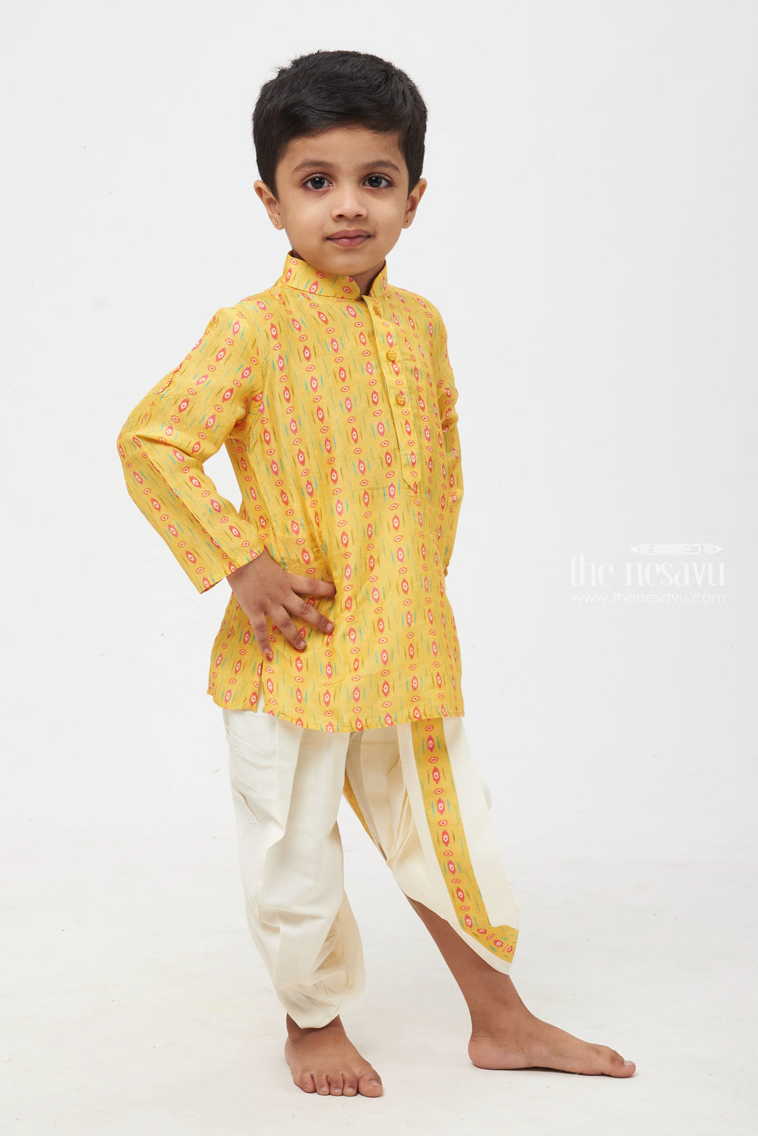 The Nesavu Boys Dothi Set Golden Glory: Mesmerizing Ikat Print Yellow Kurta with Traditional White Dhoti for Boys Nesavu Designer Boys Ethnic Outfits | Latest Kurta with Dhoti Set | The Nesavu