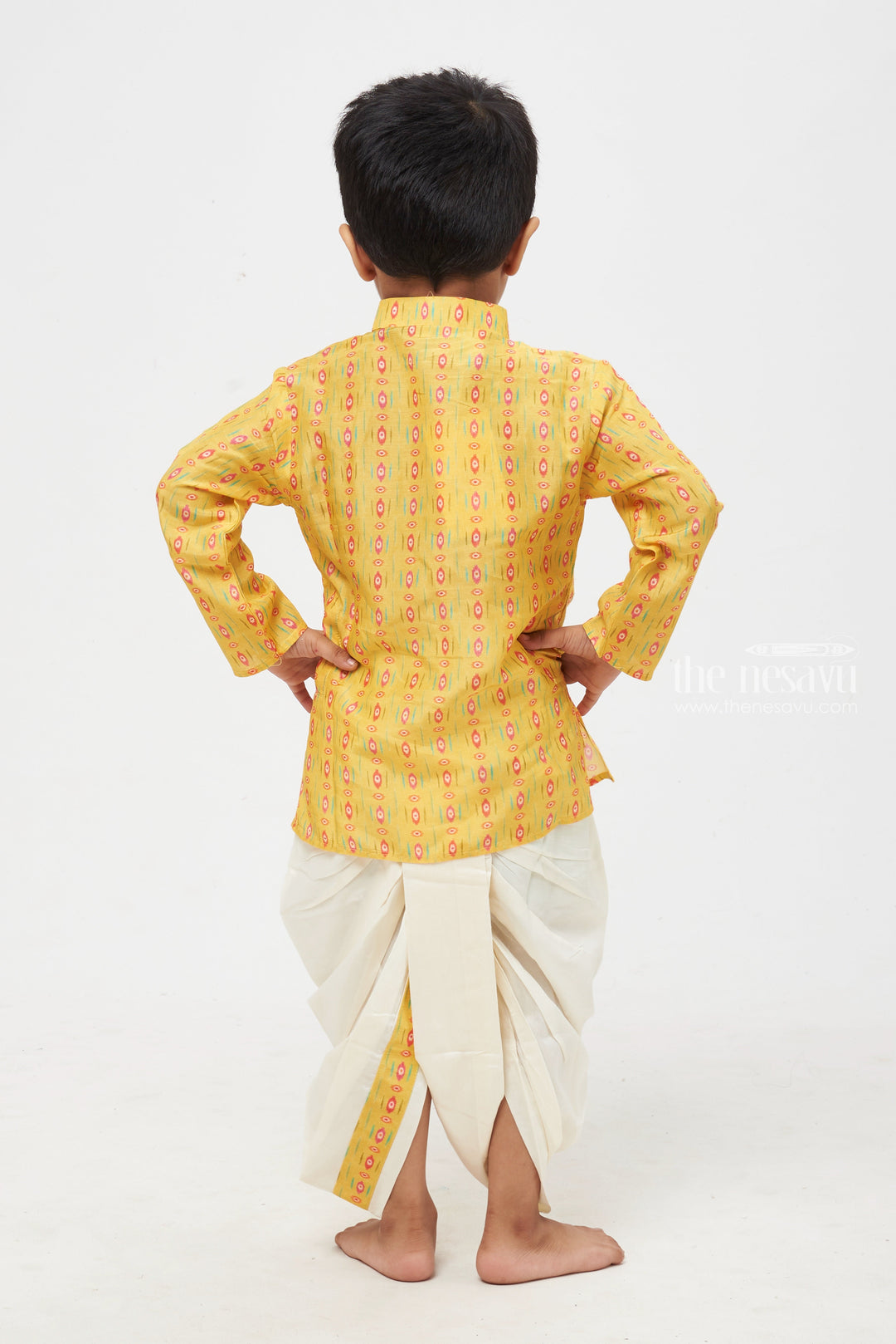 The Nesavu Boys Dothi Set Golden Glory: Mesmerizing Ikat Print Yellow Kurta with Traditional White Dhoti for Boys Nesavu Designer Boys Ethnic Outfits | Latest Kurta with Dhoti Set | The Nesavu
