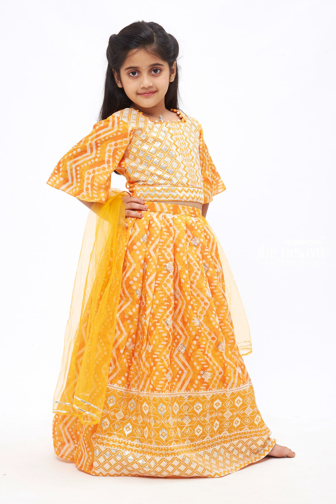 The Nesavu Girls Lehenga Choli Golden Radiance: Exquisite Patterned Orange Lehenga Choli for Girls Nesavu Diwali Princess | Traditional Lehenga Choli Sets for Girls | The Nesavu