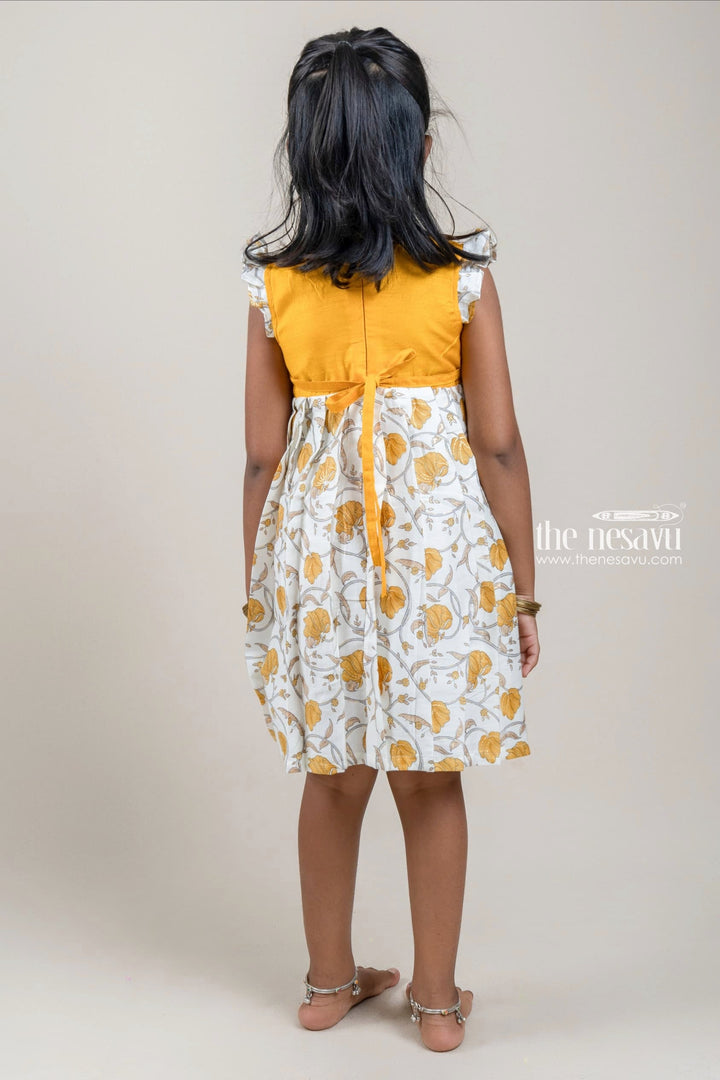 The Nesavu Girls Cotton Frock Golden Yellow With White Cotton Frock For Girls Kids Nesavu Flutter Sleeve Design Ideas | Printed Cotton Gown Collection | The Nesavu