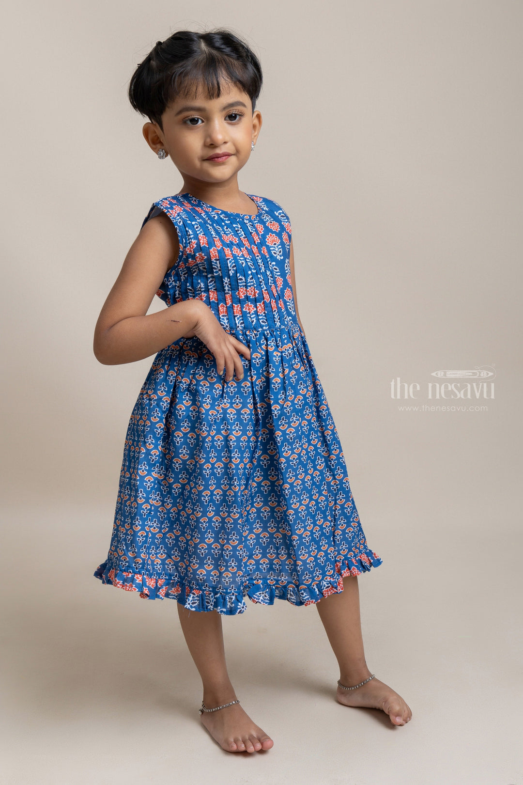 The Nesavu Girls Fancy Frock Gorgeous Blue Pleated Yoke With Floral Printed Sleeveless Cotton Frock For Girls Nesavu Pretty Floral Printed Cotton Frock For Girls | Trendy Cotton Frocks | The Nesavu