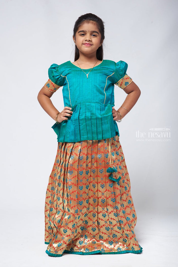 The Nesavu Pattu Pavadai Gorgeous Green Silk Peplum Blouse paired with Zari Floral Pattu Pavadai: Authentic South Indian Elegance Nesavu 14 (6M) / Blue GPP293C-14 Pattu Pavadai with peplum blouse | Pattu Pavadai with Zari Border | The Nesavu