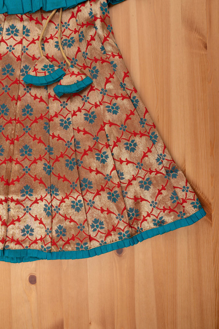 The Nesavu Pattu Pavadai Gorgeous Green Silk Peplum Blouse paired with Zari Floral Pattu Pavadai: Authentic South Indian Elegance Nesavu Pattu Pavadai with peplum blouse | Pattu Pavadai with Zari Border | The Nesavu