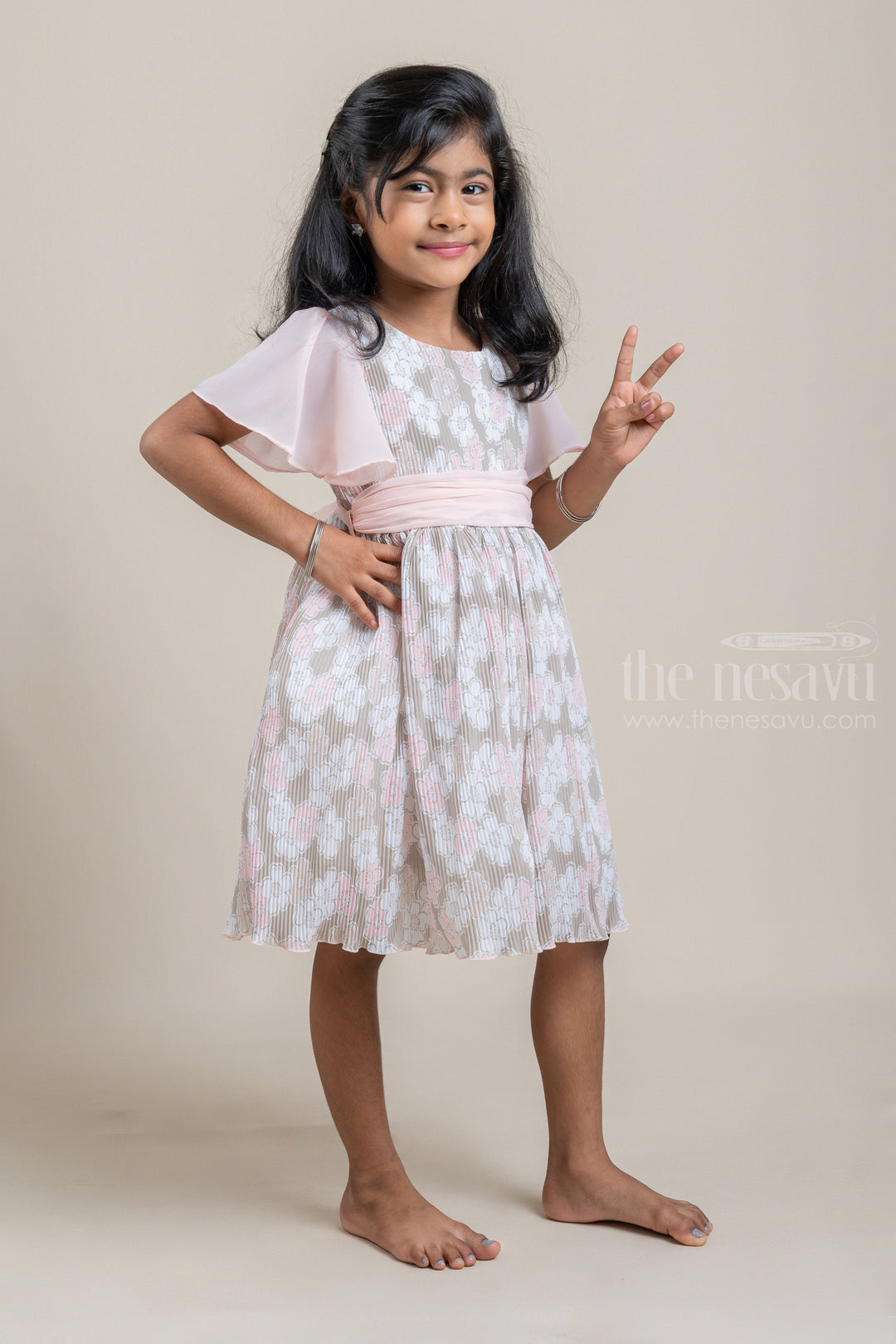 The Nesavu Frocks & Dresses Gorgette Pleated Green Colour Frock with Salmon Floral Print and Flared Sleeve for Girls psr silks Nesavu