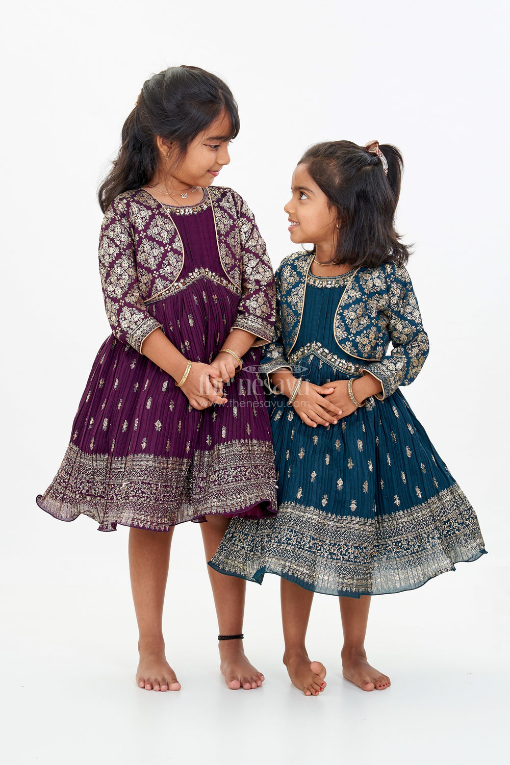The Nesavu Silk Frock Graceful Girls Green Silk Dress with Gold Foil Prints and Traditional Embellished Yoke Nesavu Nesavu Girls Green Silk Dress Gold Foil Prints Embroidered Yoke Special Occasions